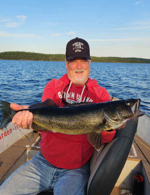 Rod Pixner with fat walleye. Rod Pixner with fat Ontario walleye.
