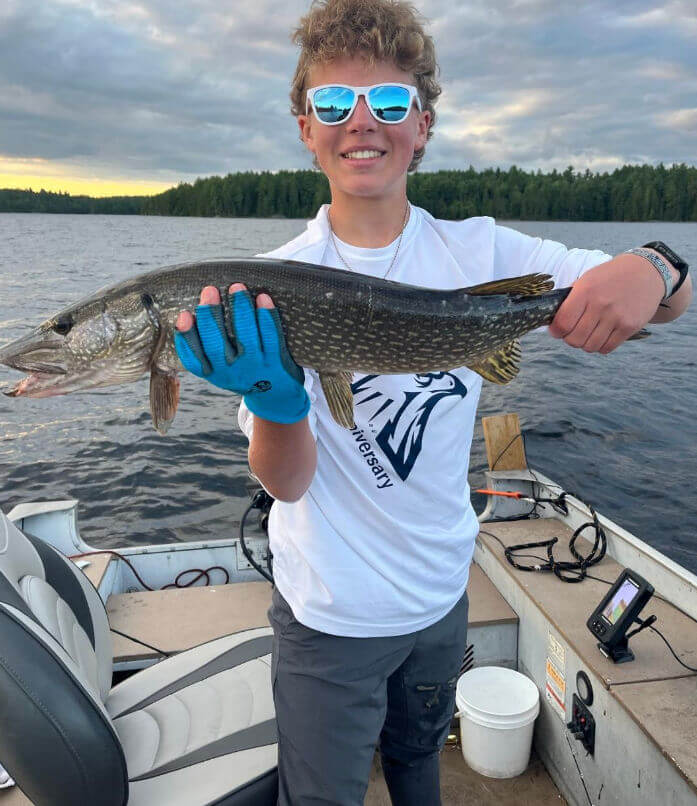 Garden Island Lodge angler holding trophy Ontario walleye.
