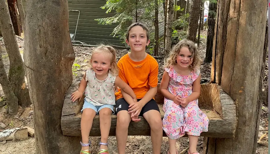 Jennalee's children sitting for a picture during their American Plan fishing vacation.