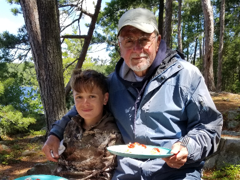  Family enjoying shore lunch