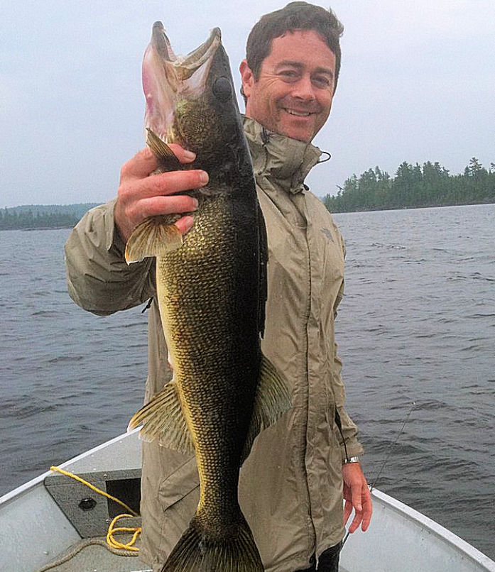 American Plan angler with large Ontario walleye.