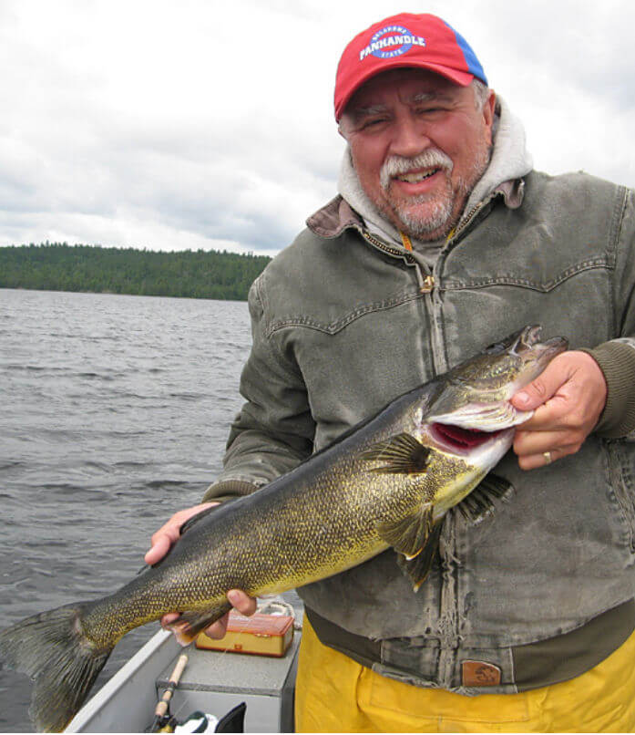 American Plan angler with large Ontario walleye.